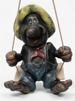Decorative sculpture designed as black happy mole on a swing 45x36cm