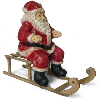Christmas decorative sculpture designed as santa claus on a sleigh 65x78cm