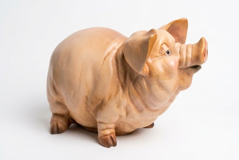 Decorative sculpture designed as light pink colored fat round pig 37x56x34 cm c548