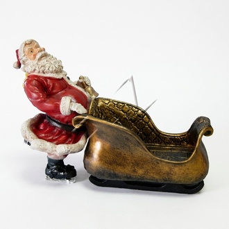 Christmas decorative sculpture designed as santa claus with a golden sleigh 52x75cm