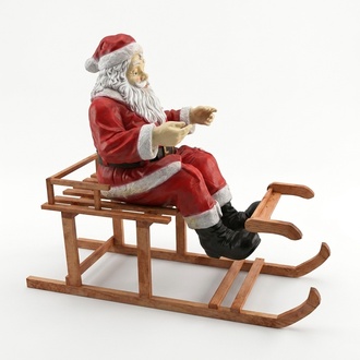 Christmas decorative sculpture designed as santa claus on a wooden sleigh 58x50x140cm