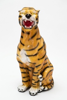 Massive decorative sculpture designed as an original colored sitting tiger 80cm height