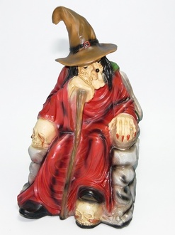Decorative sculpture designed as a colorful sitting on an armchair witch 60cm