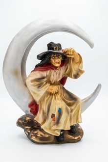 Decorative sculpture designed as witch sitting on a moon 76x63x30cm