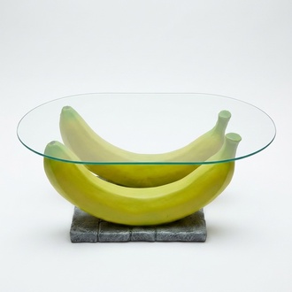 Oval glass coffee table with two decorative bananas sculpture 47x65x110cm