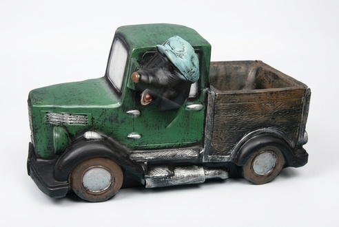 Decorative sculpture designed as mole miner on a truck 93cm height