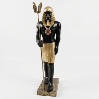 Ancient egyptian decorative sculpture designed as black golden colored guardian figure 120cm