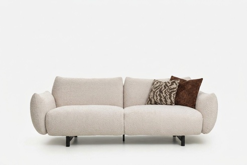 Elegant beige 3-seater sofa made of fabric in a modern design.