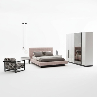 Elegant beige bedroom set made of wood and fabric.