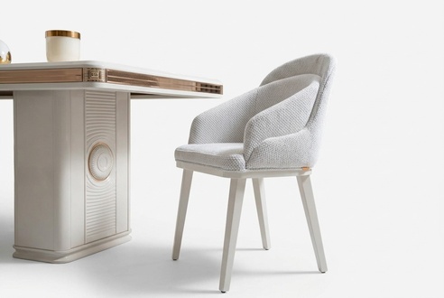 Elegant beige chairs made of textile-wood in a timeless design.