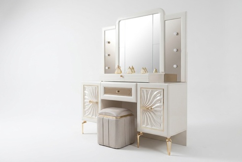 Elegant beige makeup table made of wood with mirror and pouf.