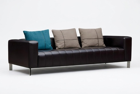 Elegant black faux leather 3-seater sofa in a modern style.