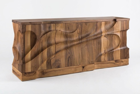 Elegant brown wooden console table in a stylish design.
