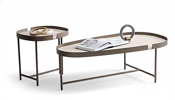 Elegant coffee table with a round shape and a sturdy metal frame.