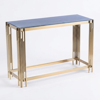 Elegant gold-colored console table made of wood and metal.