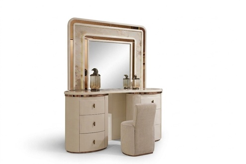 Elegant white wooden vanity table with mirror and stool.