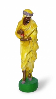 Decorative sculpture designed as gloss colorful king caspar in yellow dress 80cm