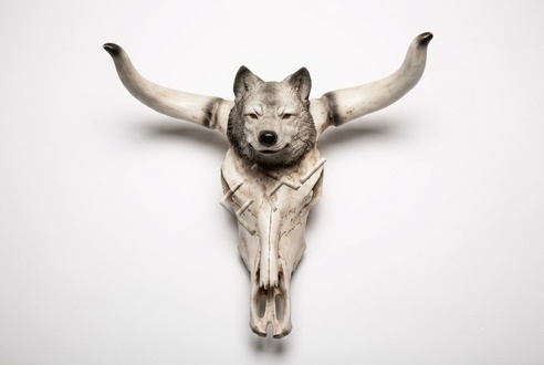 Decorative sculpture designed as cow skull with a wolf head 55cm height