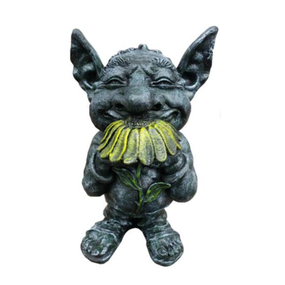 Decorative sculpture designed as a dark grey colored goblin with a sunflower 44cm G14