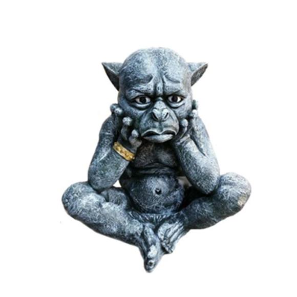 Decorative sculpture designed as a dark grey bored gargoyle with a golden bracelet 35cm G9