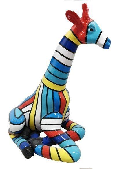 Decorative abstract sculpture designed as resting giraffe in colorful stripes 80cm