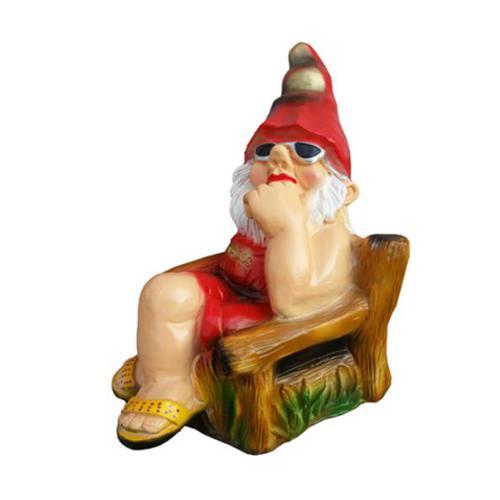 Colorful decorative sculpture designed as a dwarf sitting on a wooden armchair 55cm K37