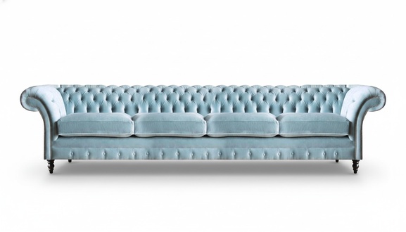 Light blue Chesterfield four-seater designer upholstered couch seating furniture