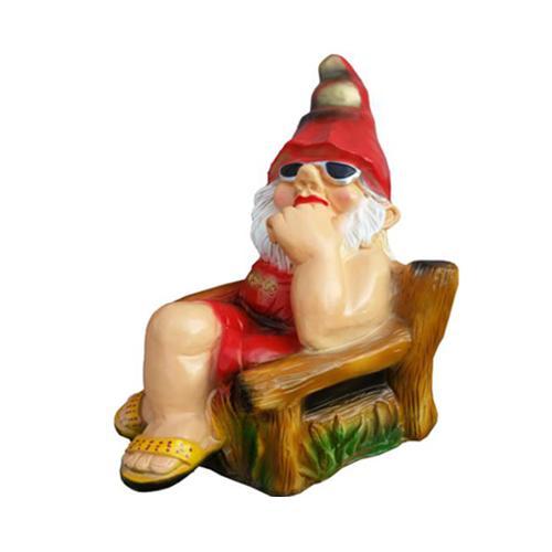 Colorful decorative sculpture designed as a dwarf sitting on a wooden armchair 85x116cm