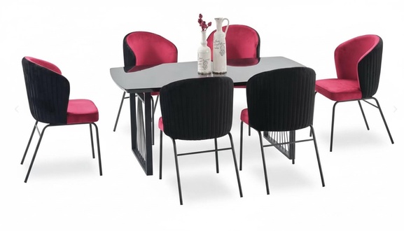 Modern dining room with rectangular table and upholstered chairs in black.