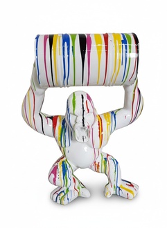 Abstract decorative sculpture designed as a gloss white colored angry gorilla with a barrel in colorful stripes 100cm