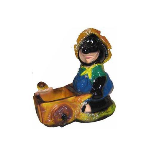 Decorative sculpture designed as a gloss mole gardener with an wheelbarrow 85 x 116 cm