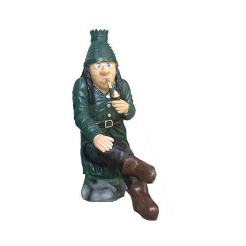 Decorative colorful sculpture designed as a sitting man with a smoking pipe