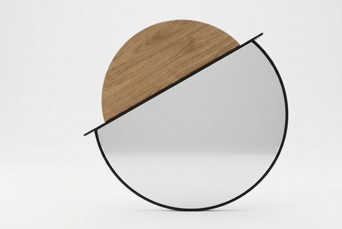Round wall mirror in a modern style – versatile and elegant mirror.