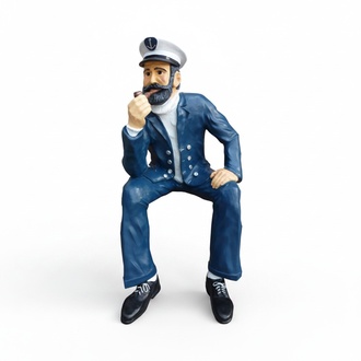 Decorative sculpture designed as a sitting sailor with a smoking pipe 123cm