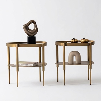 Side table duo made of stainless steel – modern and with an elegant surface.