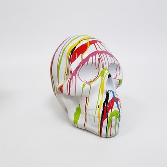 Abstract white colored decorative sculpture designed as a skull in colorful stripes 66cm