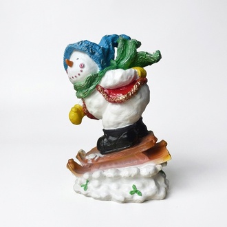 Decorative white colored snowman on a sled figure 40cm