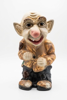 Decor figure designed as a plain poor happy dwarf 54x36cm