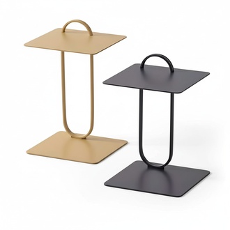 Two side tables made of stainless steel with elegant tabletops.
