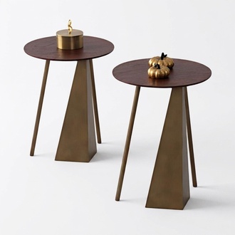 Two side tables with a stylish tabletop coffee table.