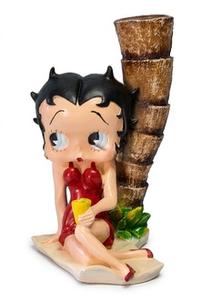 Colorful deco figure of a cartoon lady figure sitting under palm tree on the sand 50cm