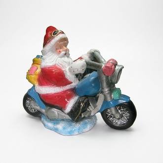 Colorful decorative sculpture designed as santa claus on a bike 60cm