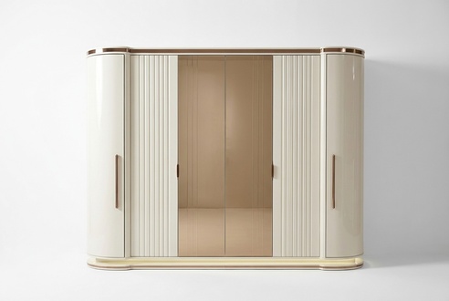 White wooden wardrobe in an elegant design for the bedroom.
