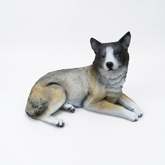 Motley white black colored decorative sculpture designed as a resting dog 43x72cm (A491)