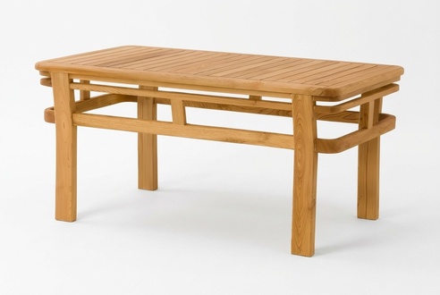 Wooden table in warm brown with an elegant design.