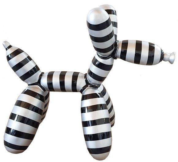 Abstract decorative sculpture designed as white black stripes colored balloon animal figure