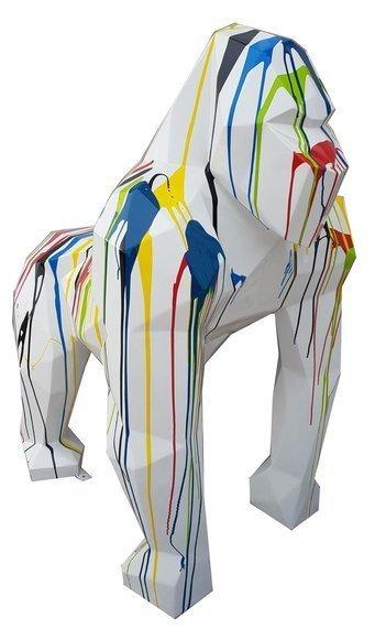 Abstract decorative sculpture designed as a white colored geometric gorilla with colorful stripes 128cm