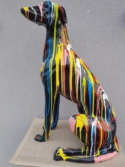 Abstract decorative sculpture designed as gloss black colored sitting dog with colorful stripes 80cm (A490)