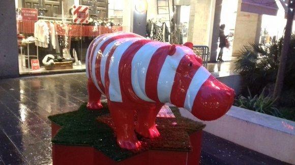 Abstract decorative sculpture of white/red colored hippopotamus figure 180cm height