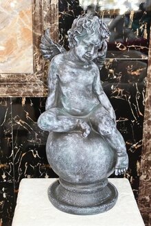 Statue Figure Angel on Earth Globe Statues Sculptures Decoration On Stock